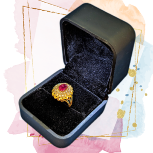 Elegant Gold-Plated Filigree Ring with Red Gemstone